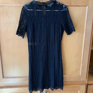 Francesca’s black lace dress